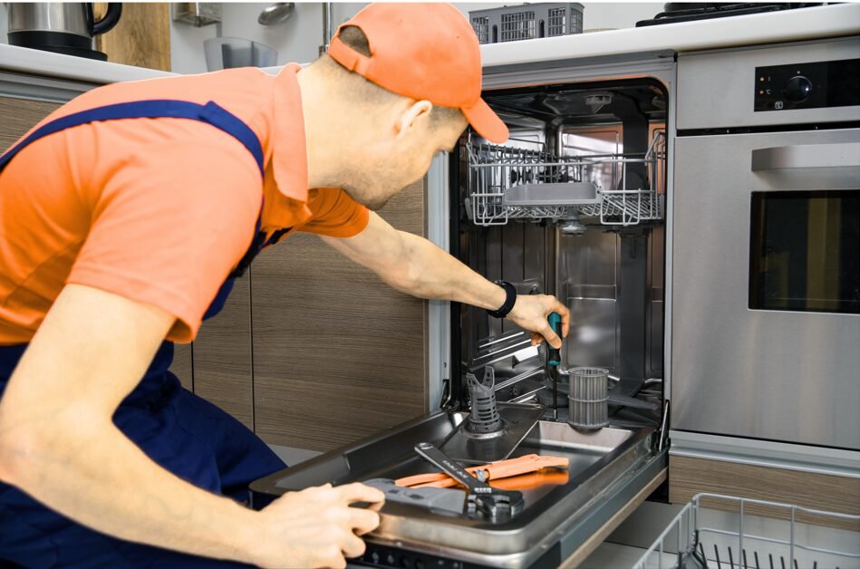 Appliance repair technician servicing a home appliance in Abilene TX